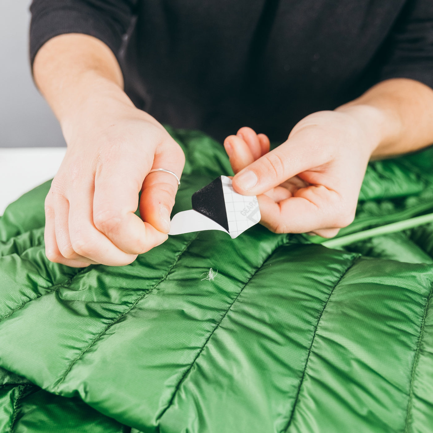 Tenacious Tape 101: How to Patch Sleeping Pads, Puffy Jackets
